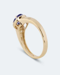 Ring mit Tansanit AAAAA & Zirkonen