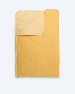 Seersucker und Peach Wendesteppbett