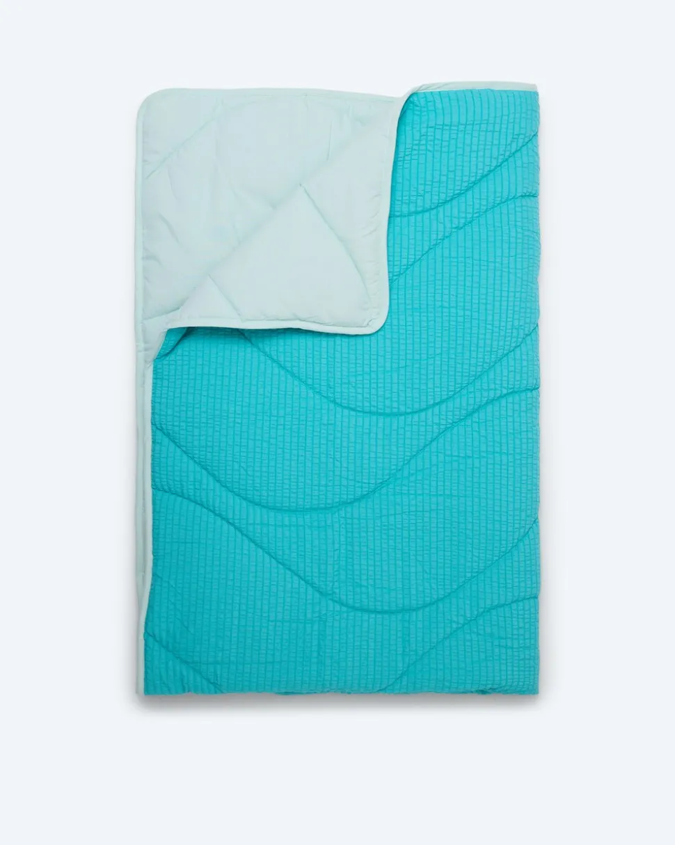 Seersucker und Peach Wendesteppbett